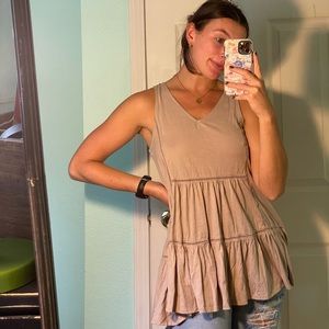 Long, mermaid style tank top.